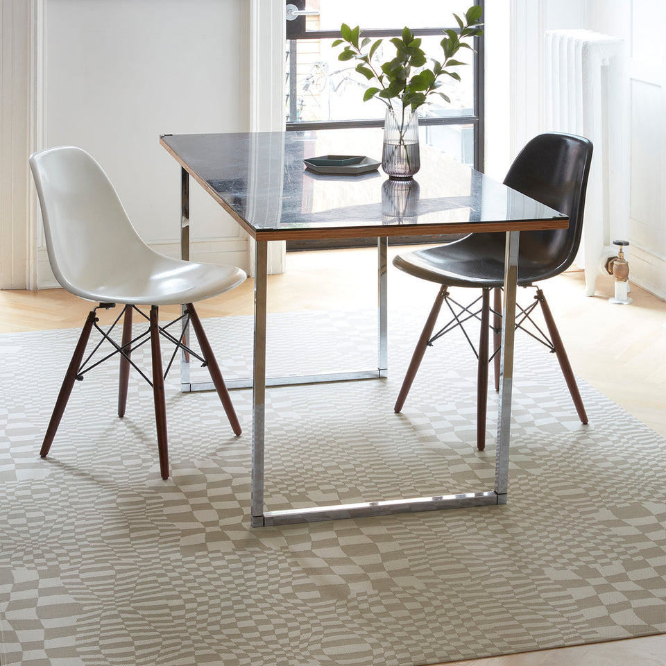 Warp / Sand woven floor mat by Chilewich, interior setting