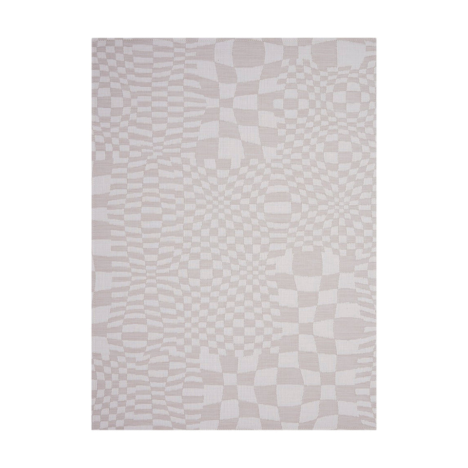 Warp / Sand woven floor mat by Chilewich, studio view
