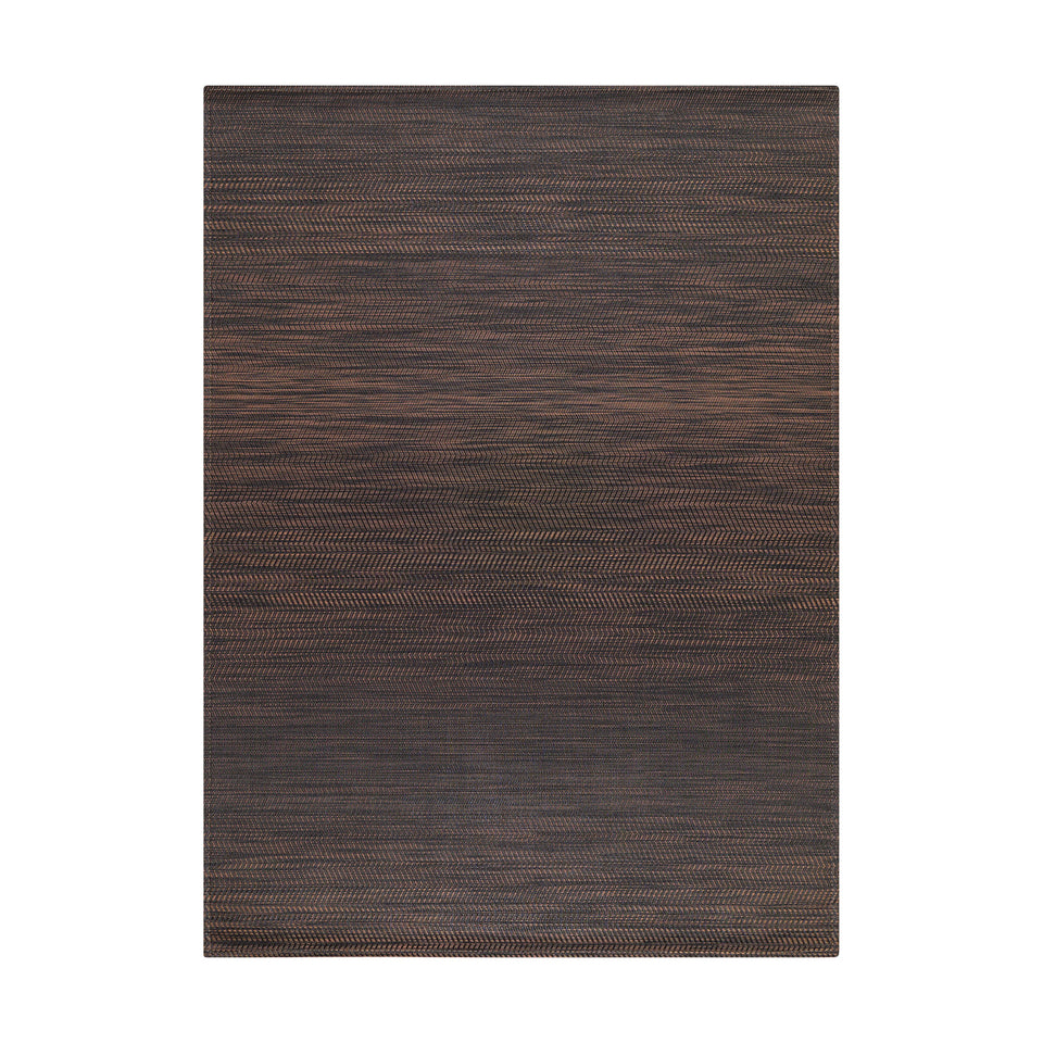 Wave / Tiger Eye woven floor mat by Chilewich, studio view