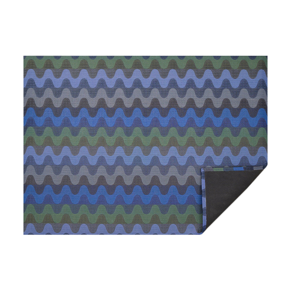 Deep Sea Wiggle woven floor mat by Chilewich, horizontal folded-corner view