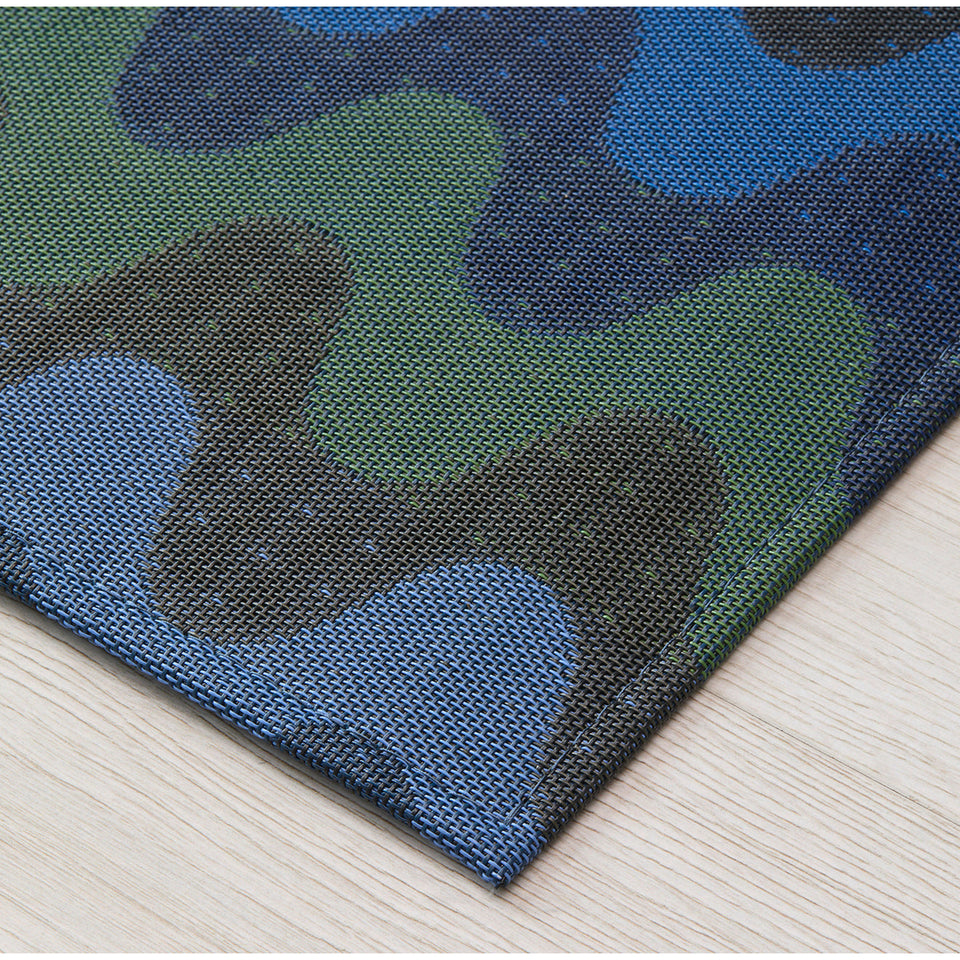 Wiggle / Deep Sea woven floor mat by Chilewich, interior setting