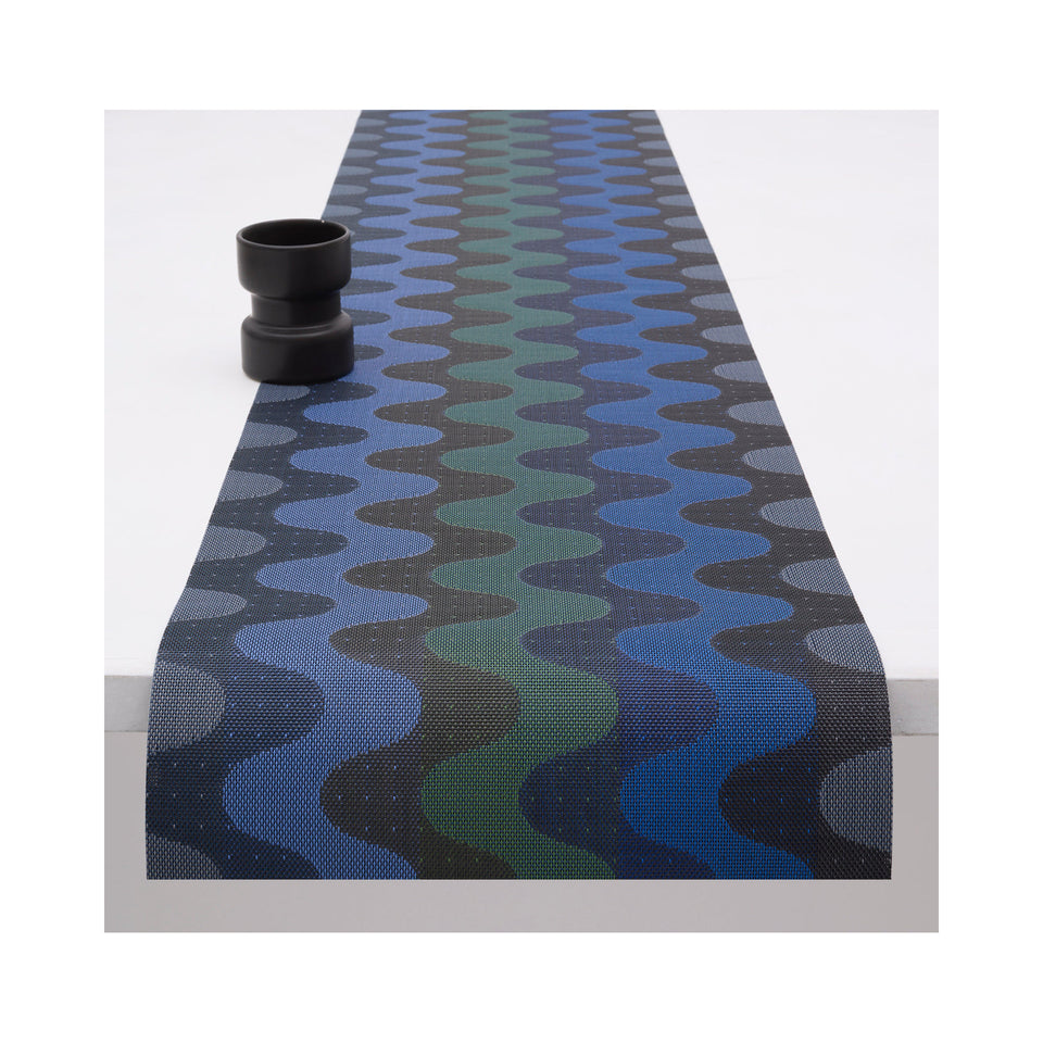 Chilewich Wiggle table runner in Deep Sea, draped across a table