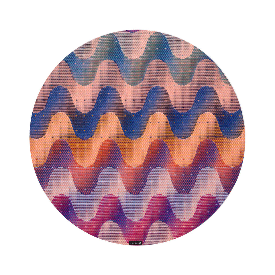 Chilewich Wiggle round placemat in Heatwave, viewed from above on a white background