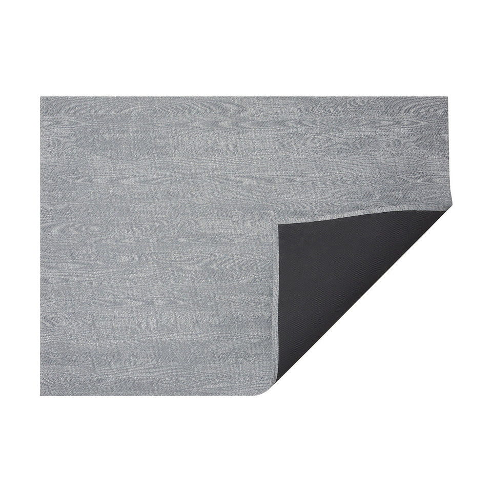 Slate Woodgrain woven floor mat by Chilewich, horizontal folded-corner view