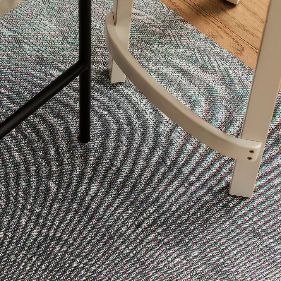 Woodgrain / Slate woven floor mat by Chilewich, interior setting