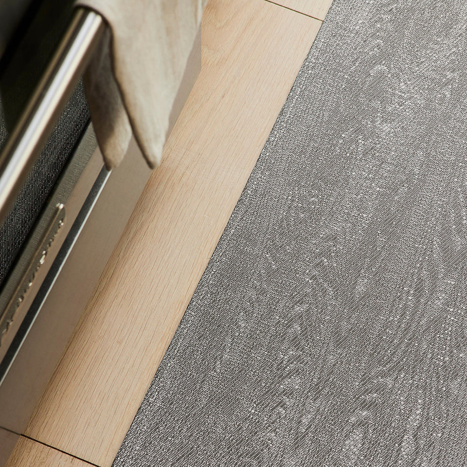 Woodgrain / Umber woven floor mat by Chilewich, interior setting
