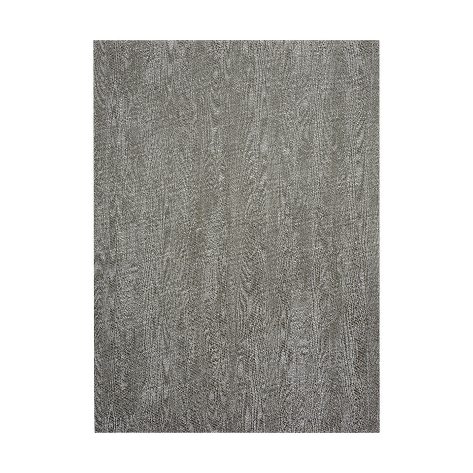 Woodgrain / Umber woven floor mat by Chilewich, studio view
