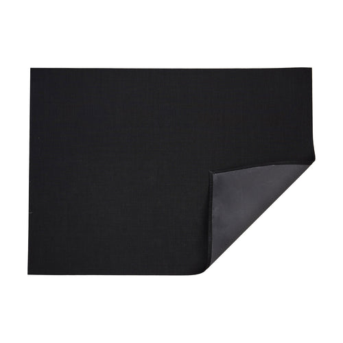 Mini Basketweave / Black woven floor mat by Chilewich, folded-corner studio view