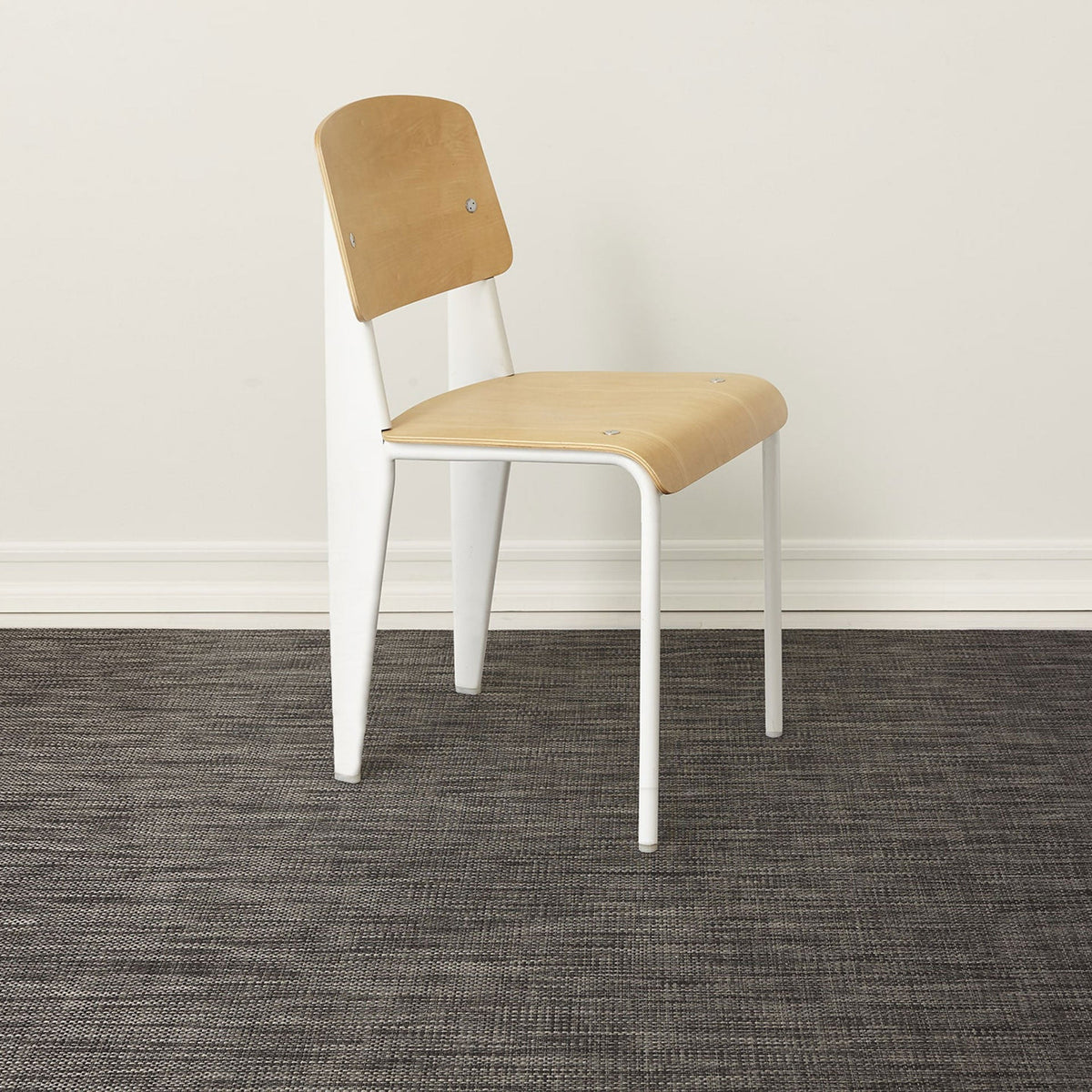 Basketweave / Carbon woven floor mat by Chilewich, interior setting