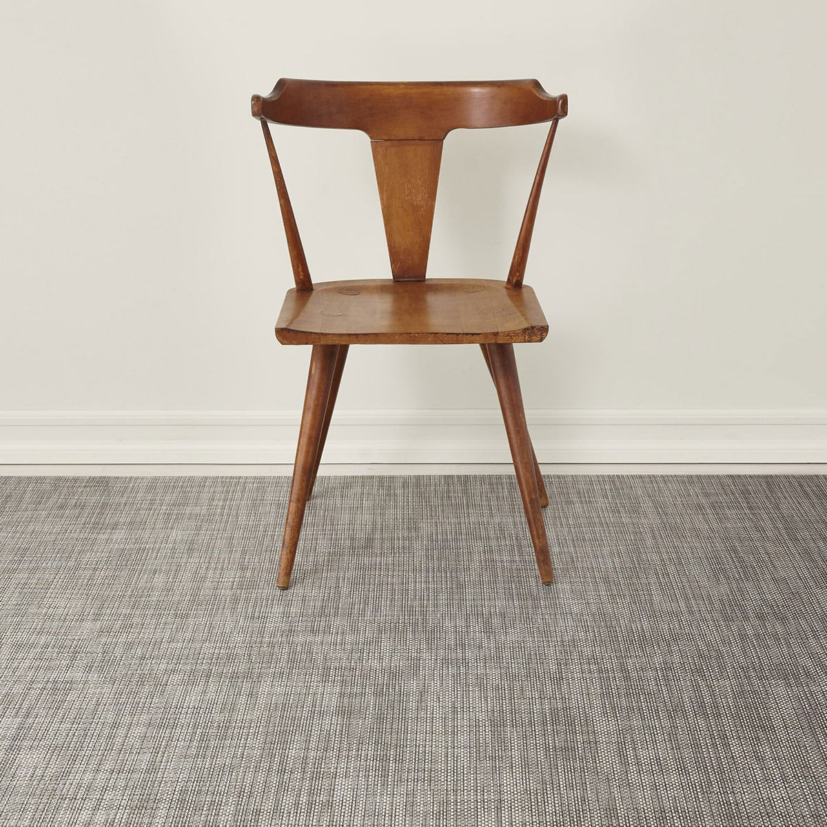 Basketweave / Oyster woven floor mat by Chilewich, interior setting