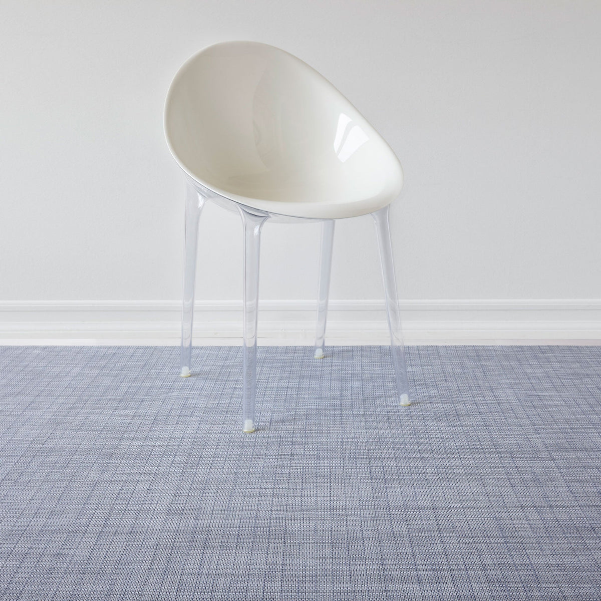 Thatch / Rain woven floor mat by Chilewich, interior setting