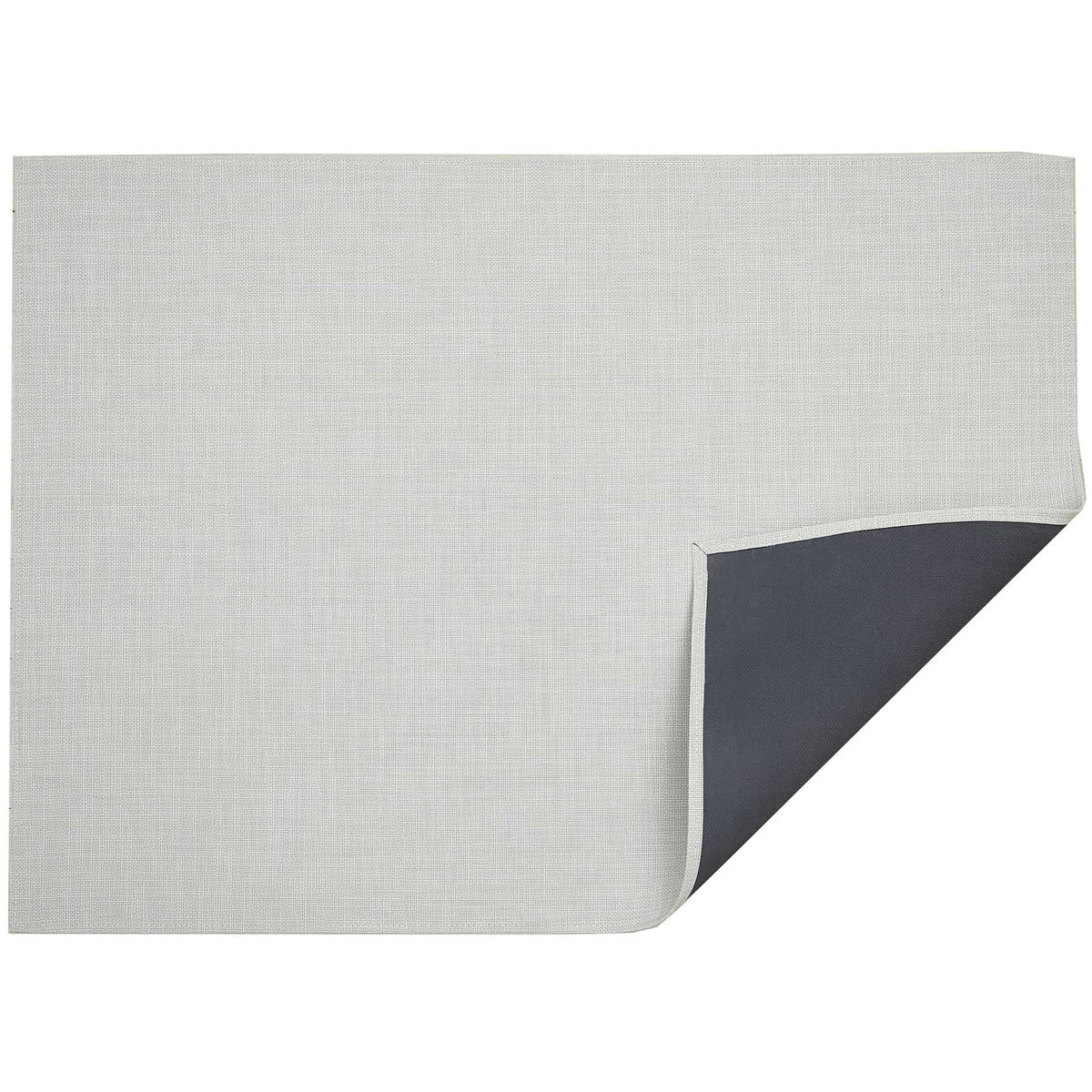 Mini Basketweave / Sandstone woven floor mat by Chilewich, folded-corner studio view