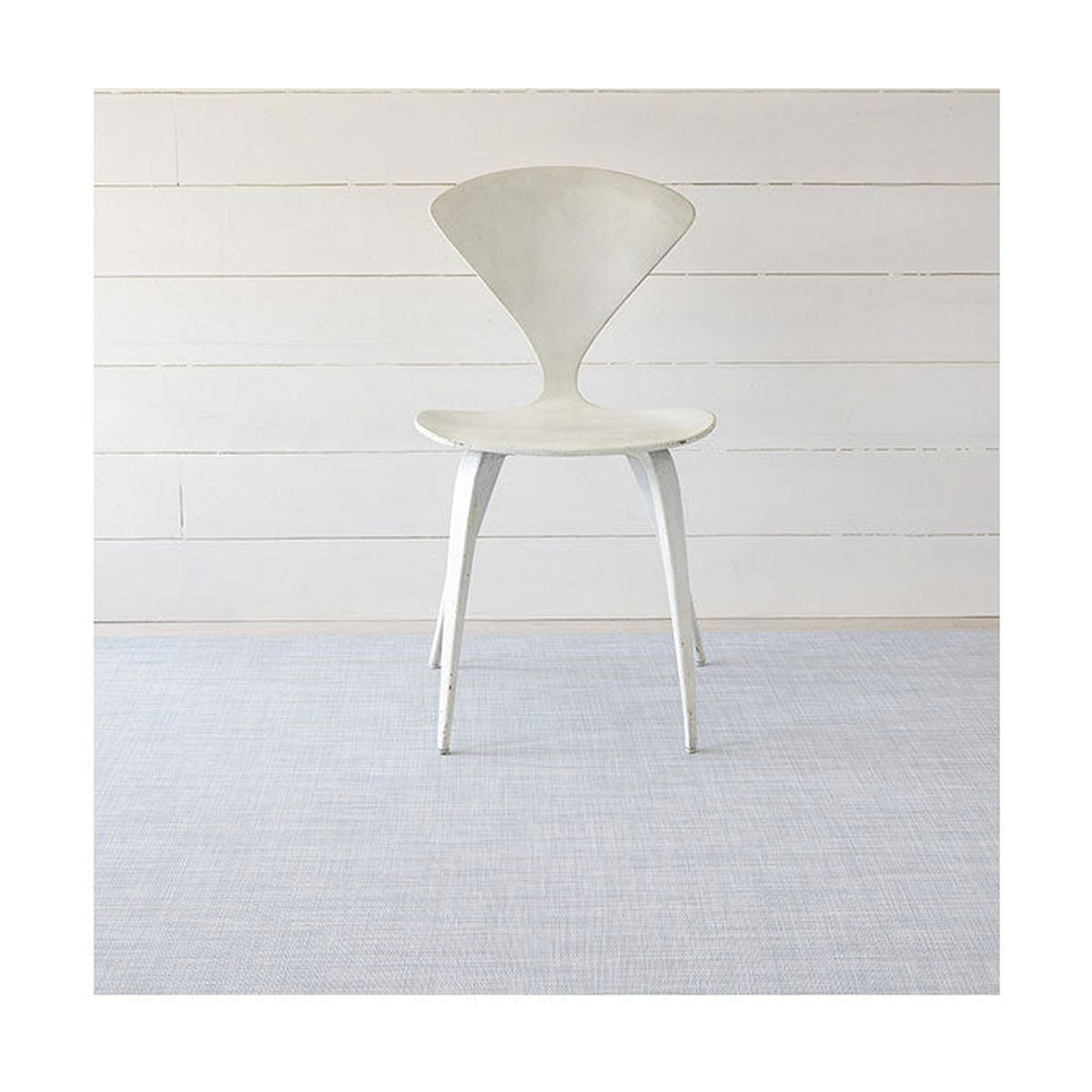 Mini Basketweave / Sky woven floor mat by Chilewich, interior setting