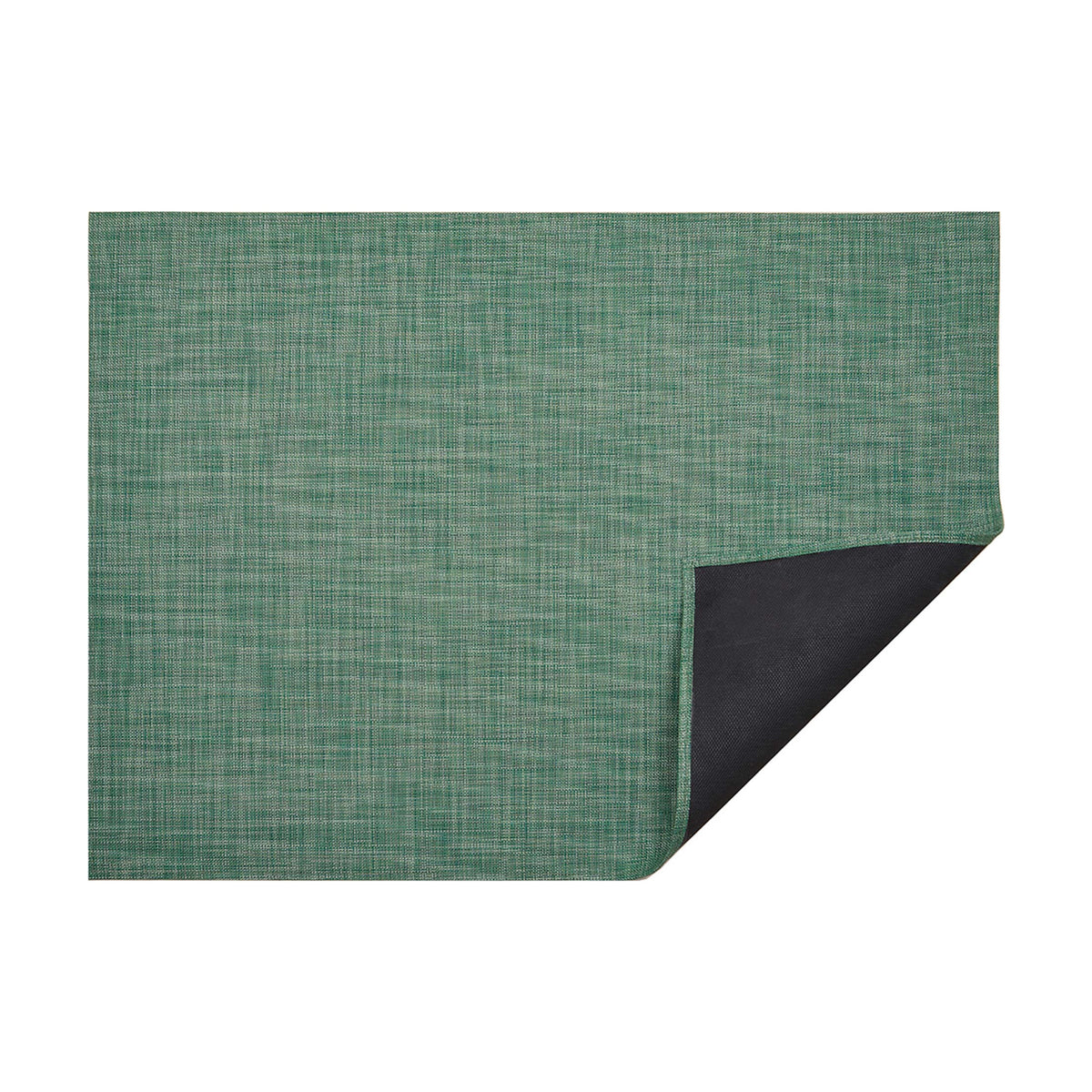 Mini Basketweave / Ivy woven floor mat by Chilewich, folded-corner studio view