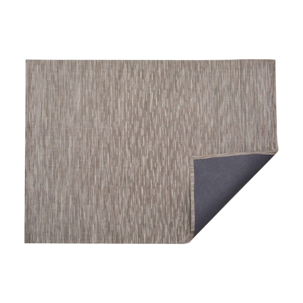 Bamboo / Dune woven floor mat by Chilewich, folded-corner studio view