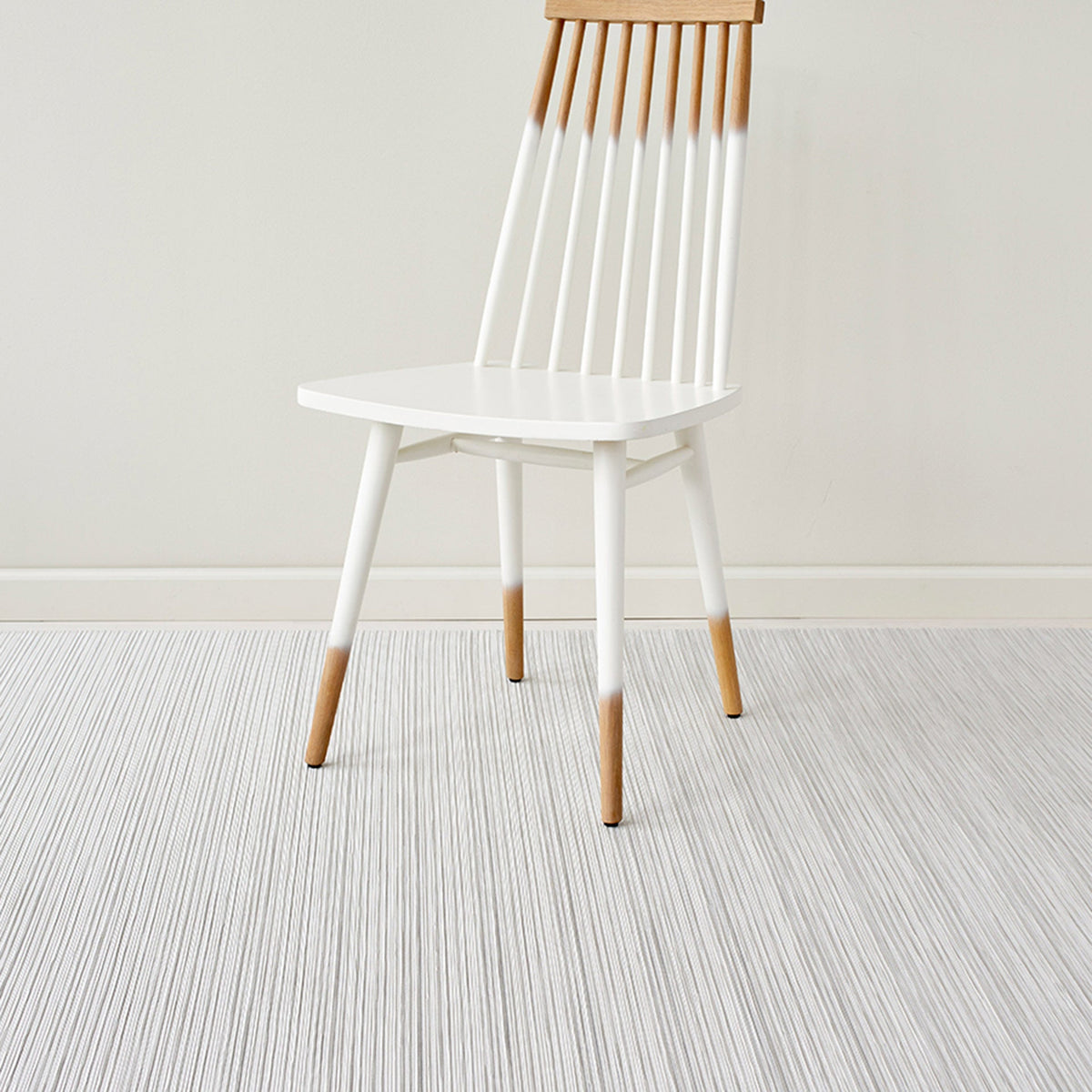 Rib Weave / Birch woven floor mat by Chilewich, interior setting