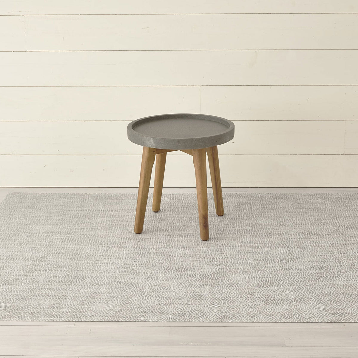 Mosaic / Grey woven floor mat by Chilewich, interior setting
