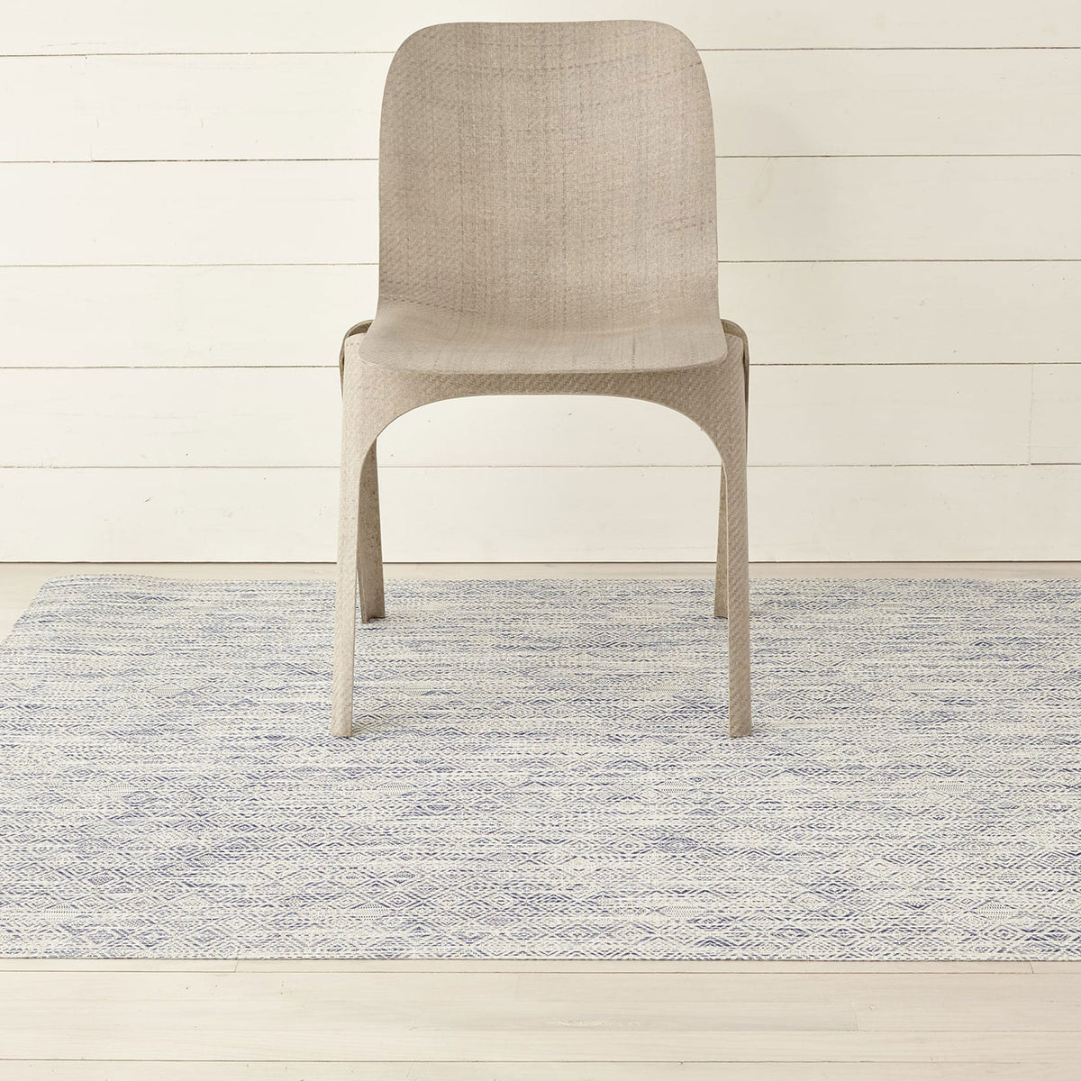 Mosaic / Blue woven floor mat by Chilewich, interior setting