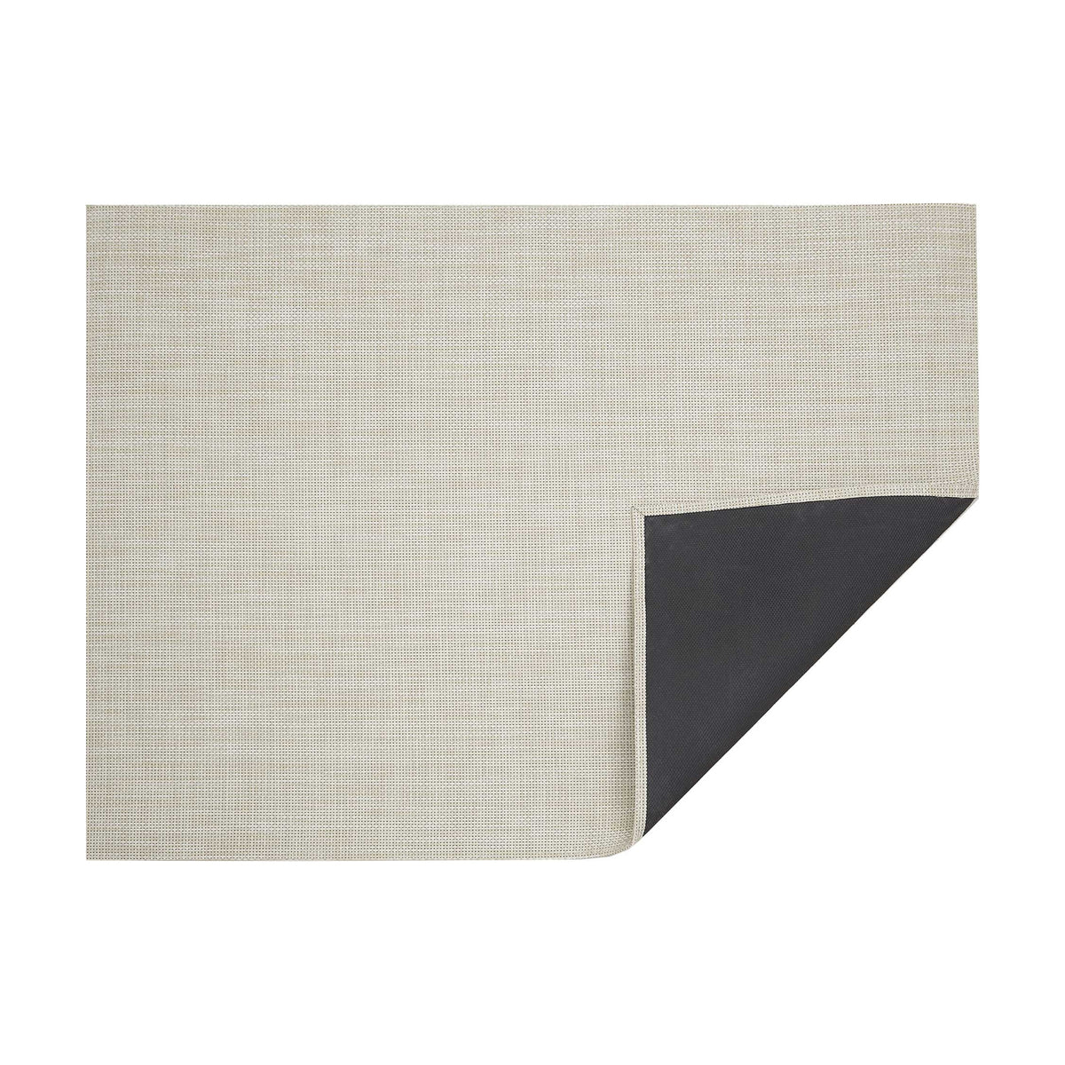 Basketweave / Khaki woven floor mat by Chilewich, folded-corner studio view