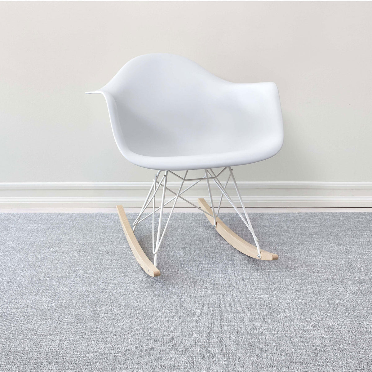 Bouclé / Moon woven floor mat by Chilewich, interior setting