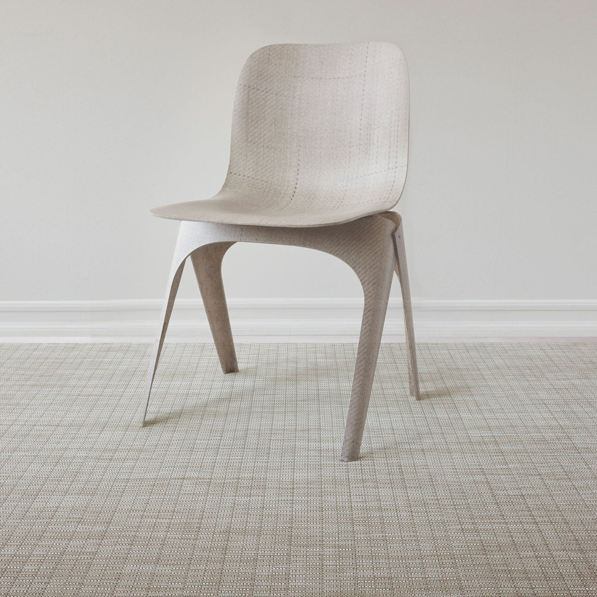 Thatch / Pebble woven floor mat by Chilewich, interior setting