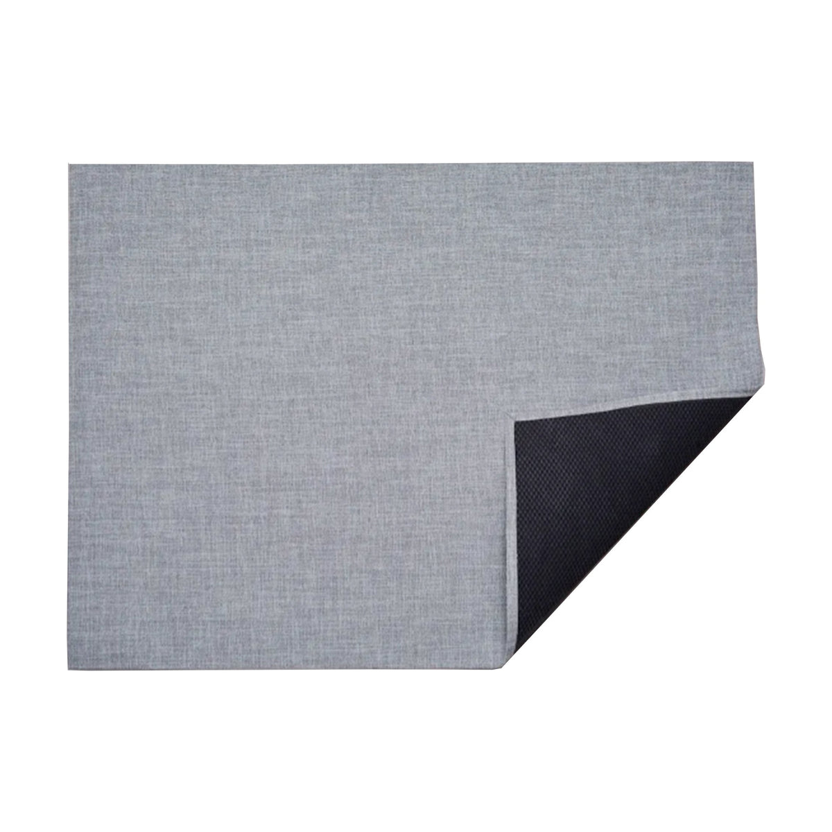 Bouclé / Moon woven floor mat by Chilewich, folded-corner studio view