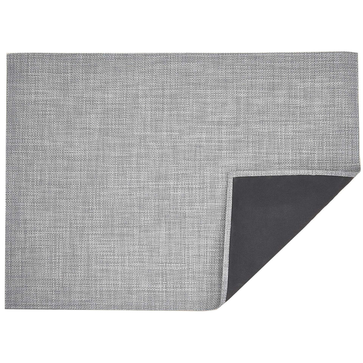 Basketweave / Shadow woven floor mat by Chilewich, folded-corner studio view