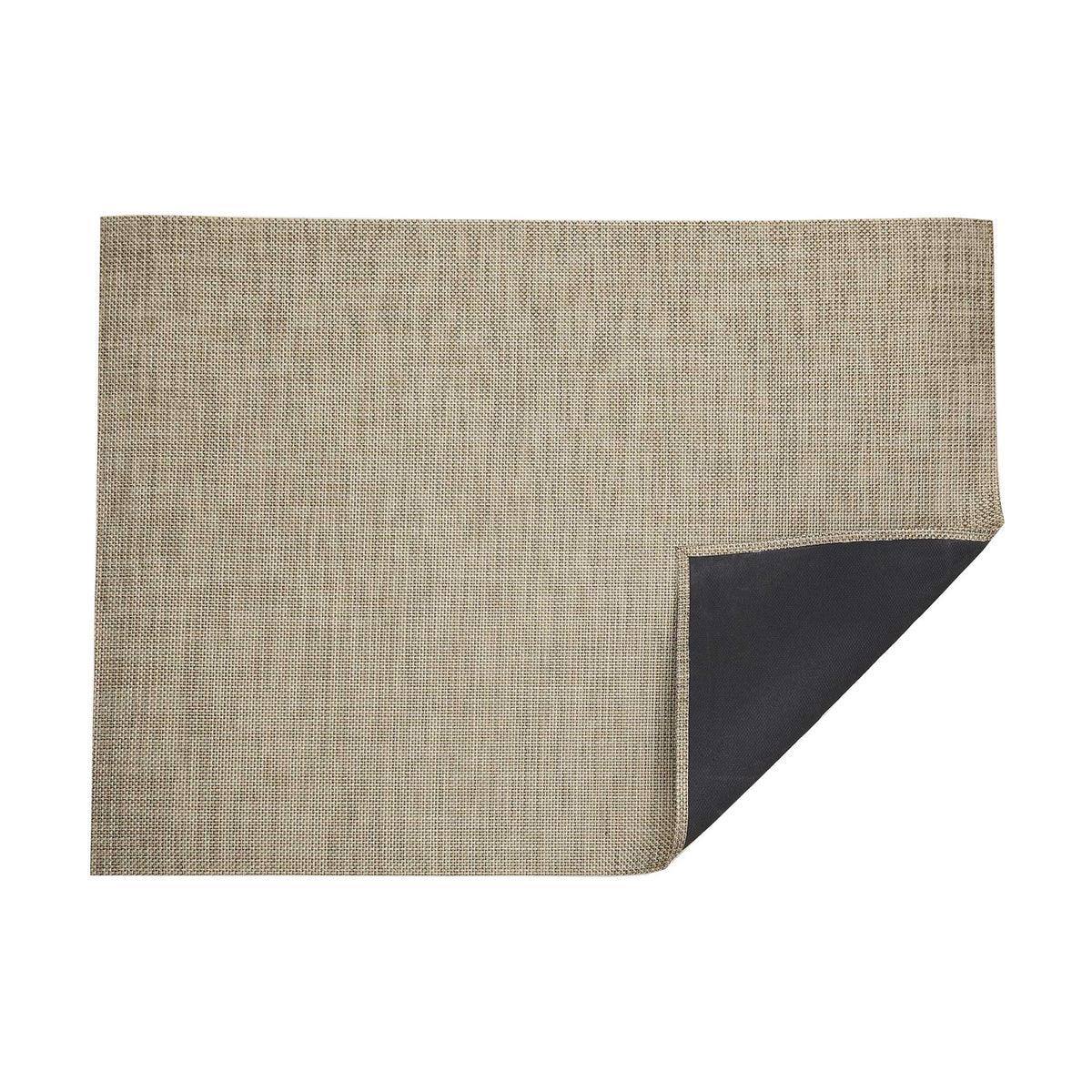 Basketweave / Latte woven floor mat by Chilewich, folded-corner studio view