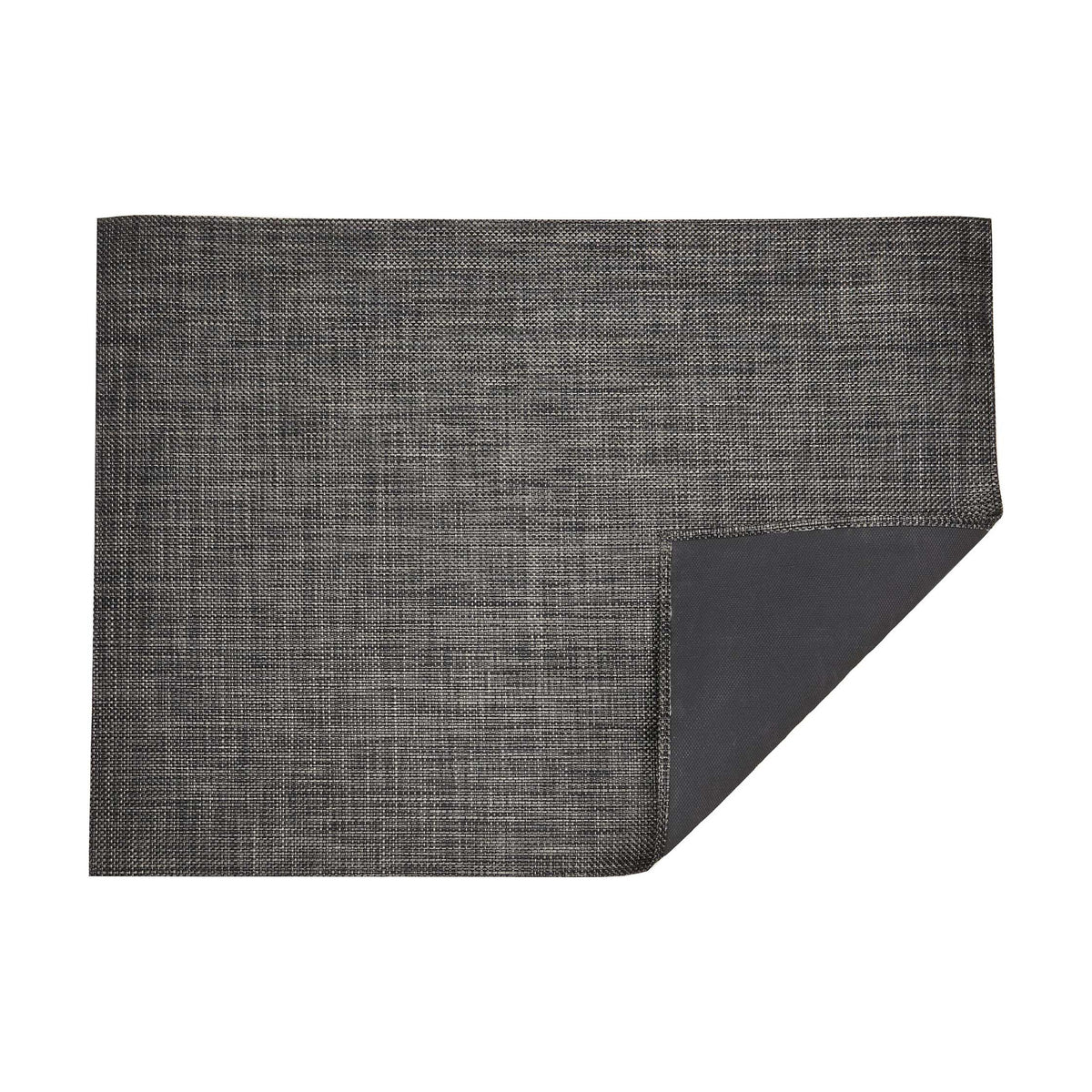 Basketweave / Carbon woven floor mat by Chilewich, folded-corner studio view