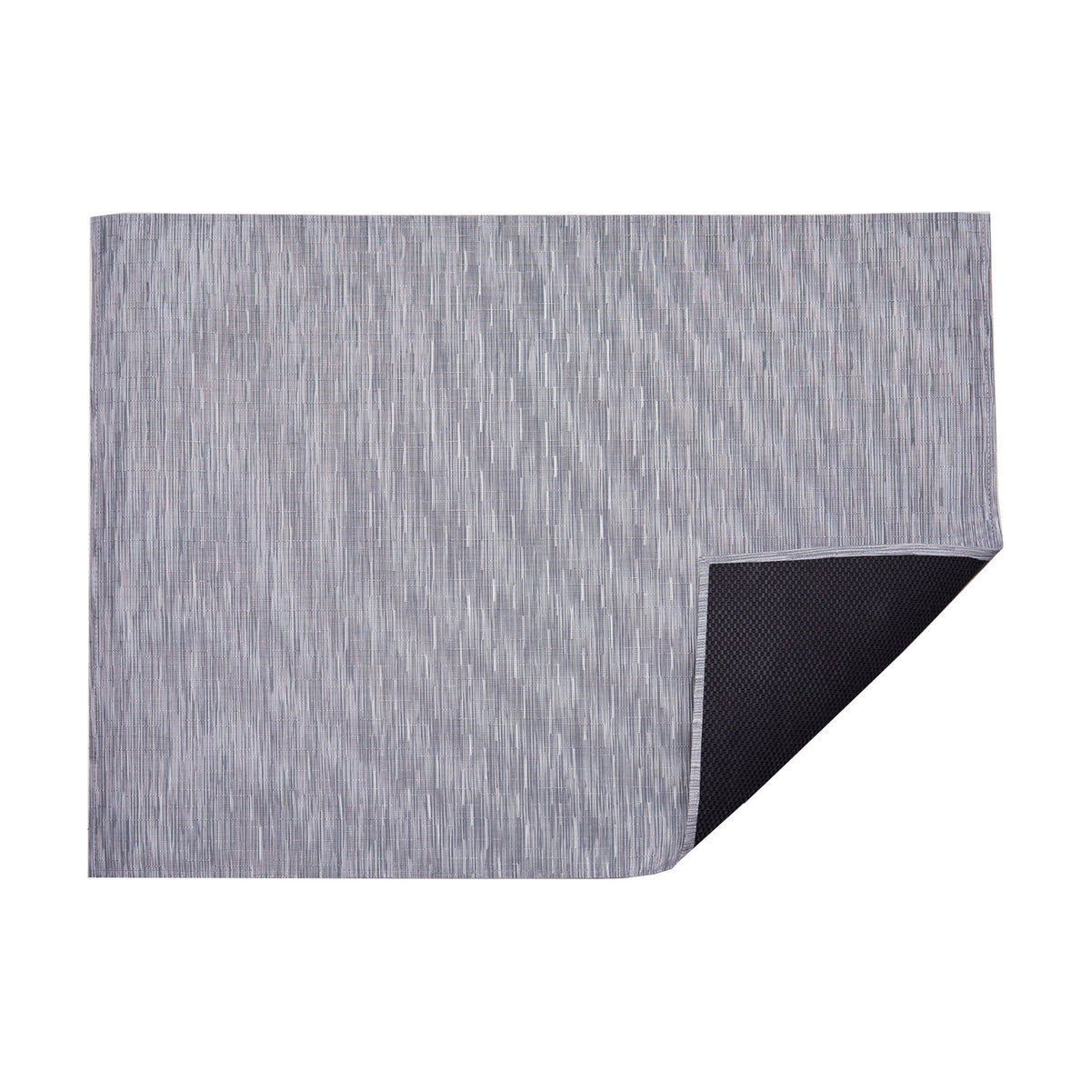 Bamboo / Fog woven floor mat by Chilewich, folded-corner studio view