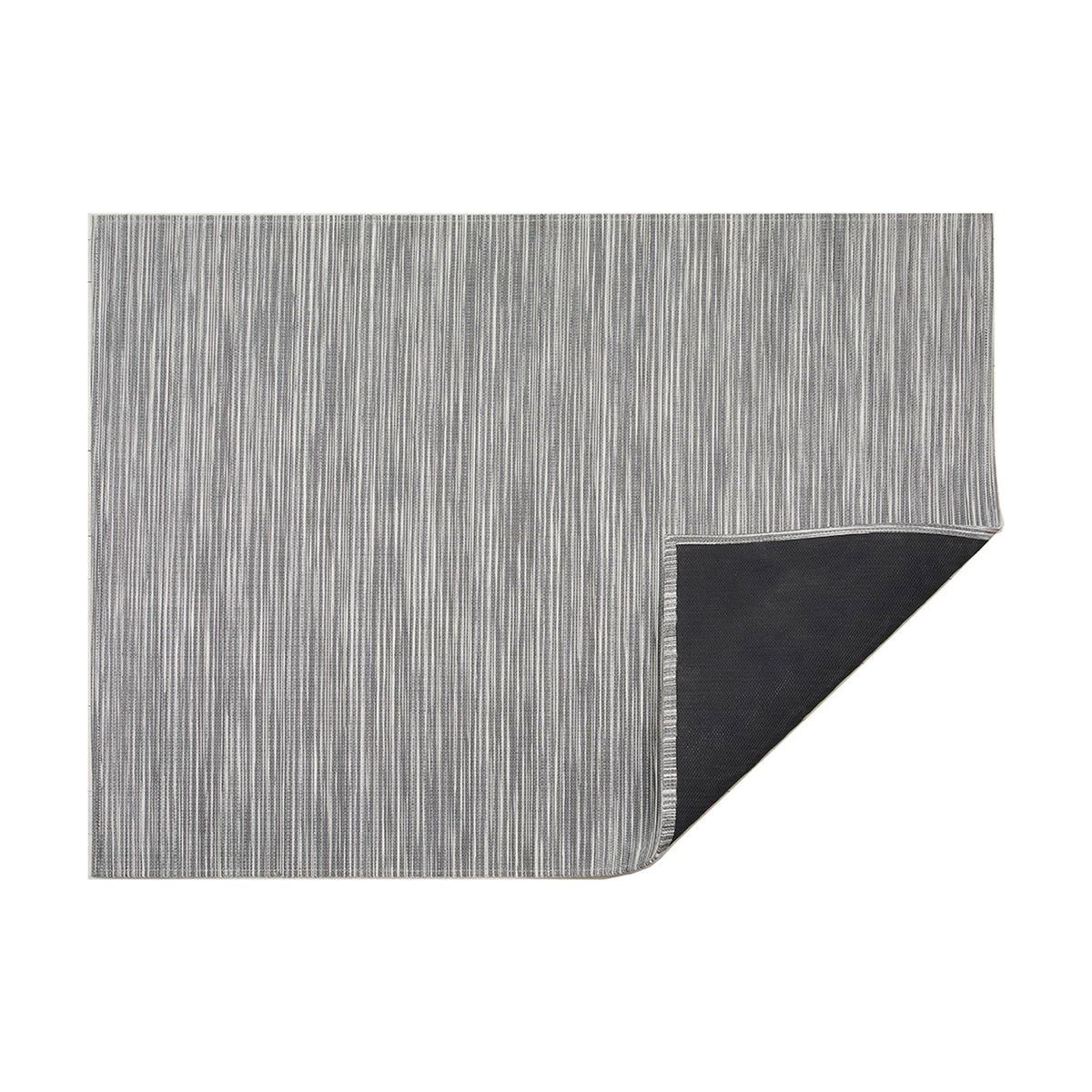 Rib Weave / Pearl woven floor mat by Chilewich, folded-corner studio view