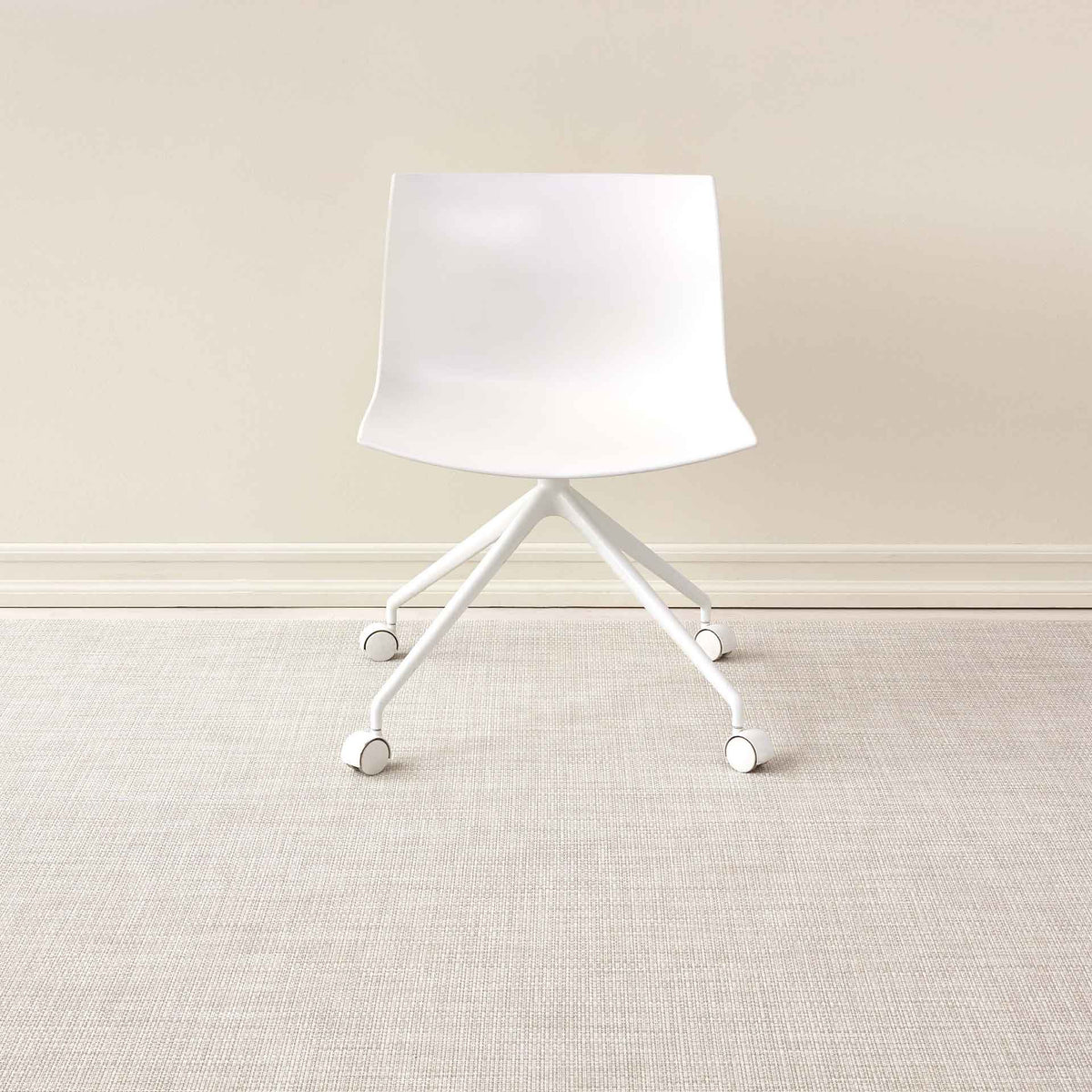 Basketweave / Natural woven floor mat by Chilewich, interior setting
