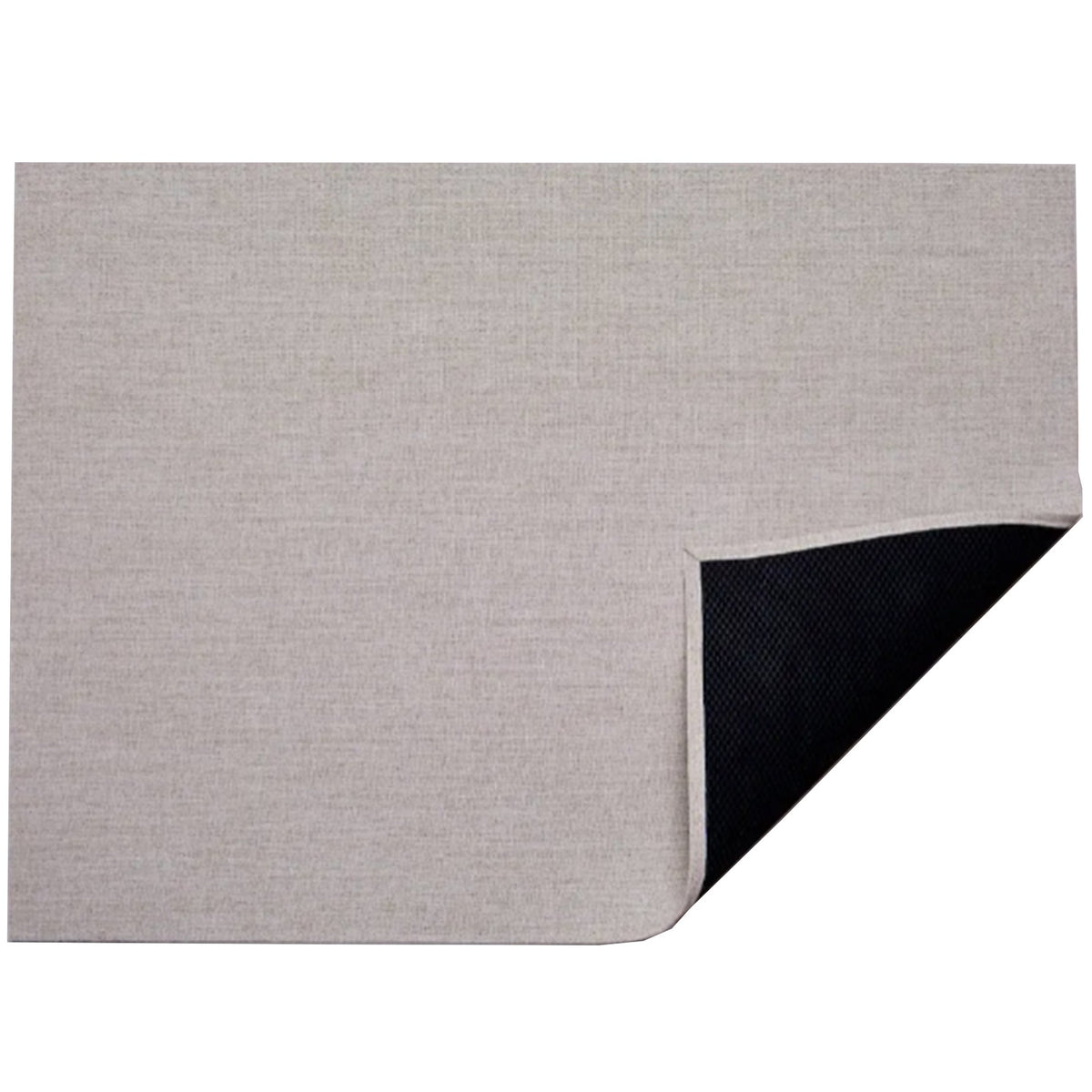 Bouclé / Natural woven floor mat by Chilewich, folded-corner studio view