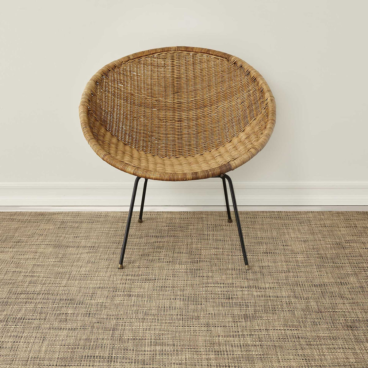 Basketweave / Bark woven floor mat by Chilewich, interior setting