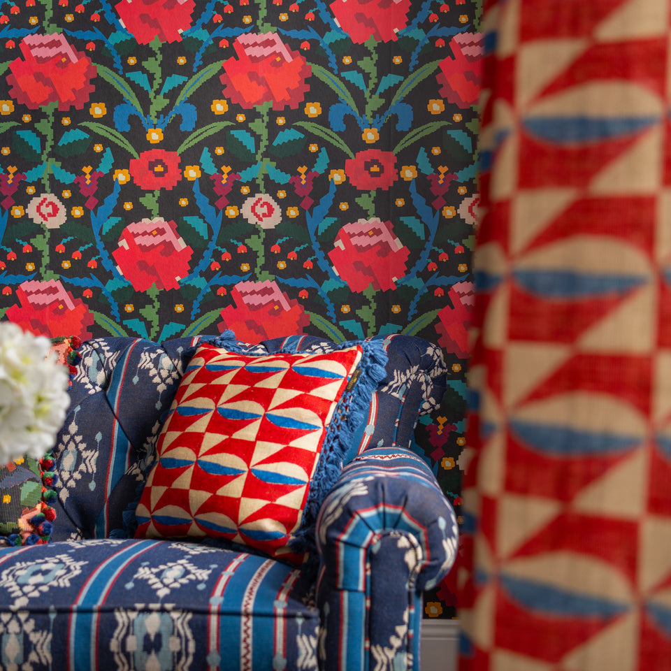 Claudine wallpaper by MINDTHEGAP, close-up in a styled interior.