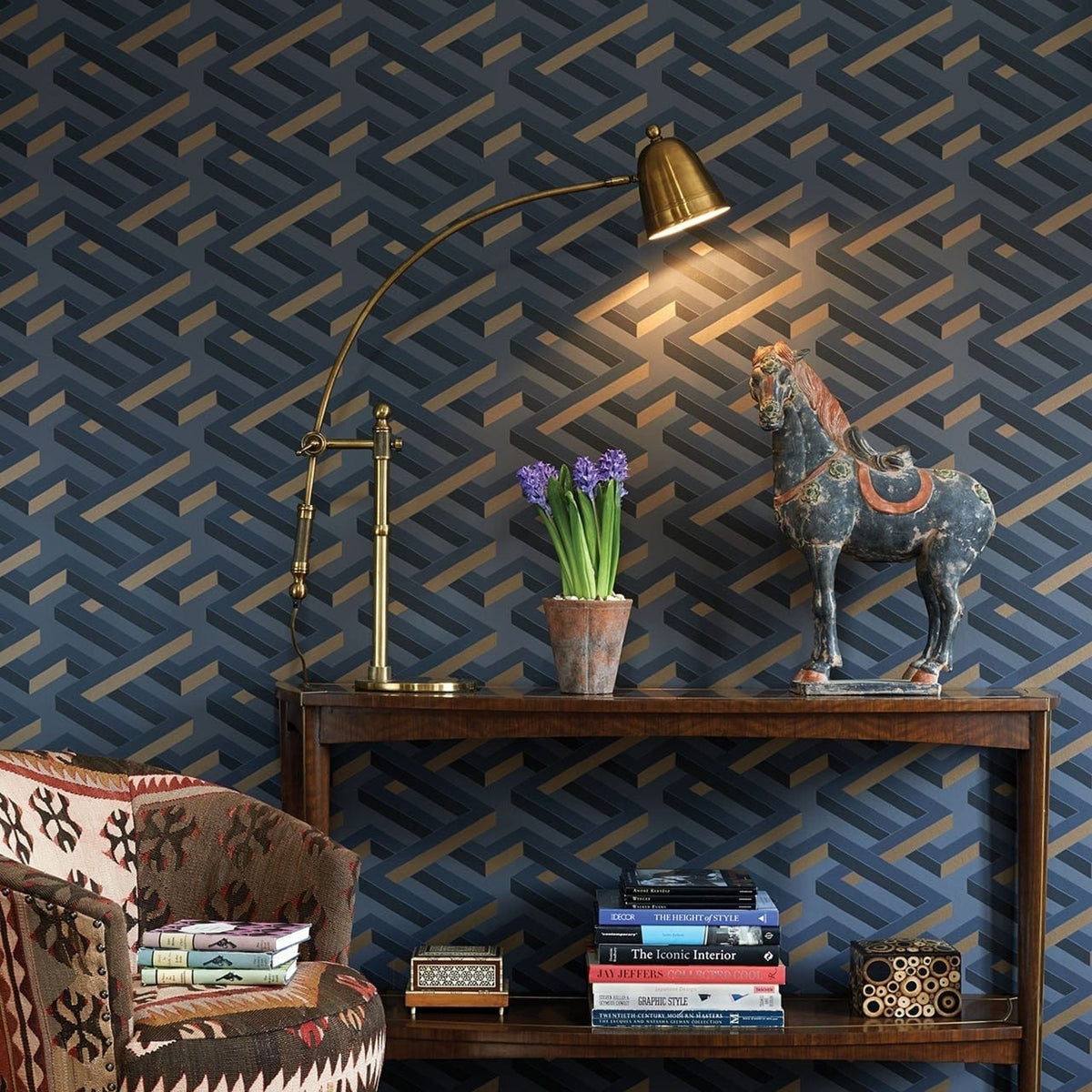 Cole & Son luxor wallpaper in Metallic Bronze on Slate Grey — lifestyle