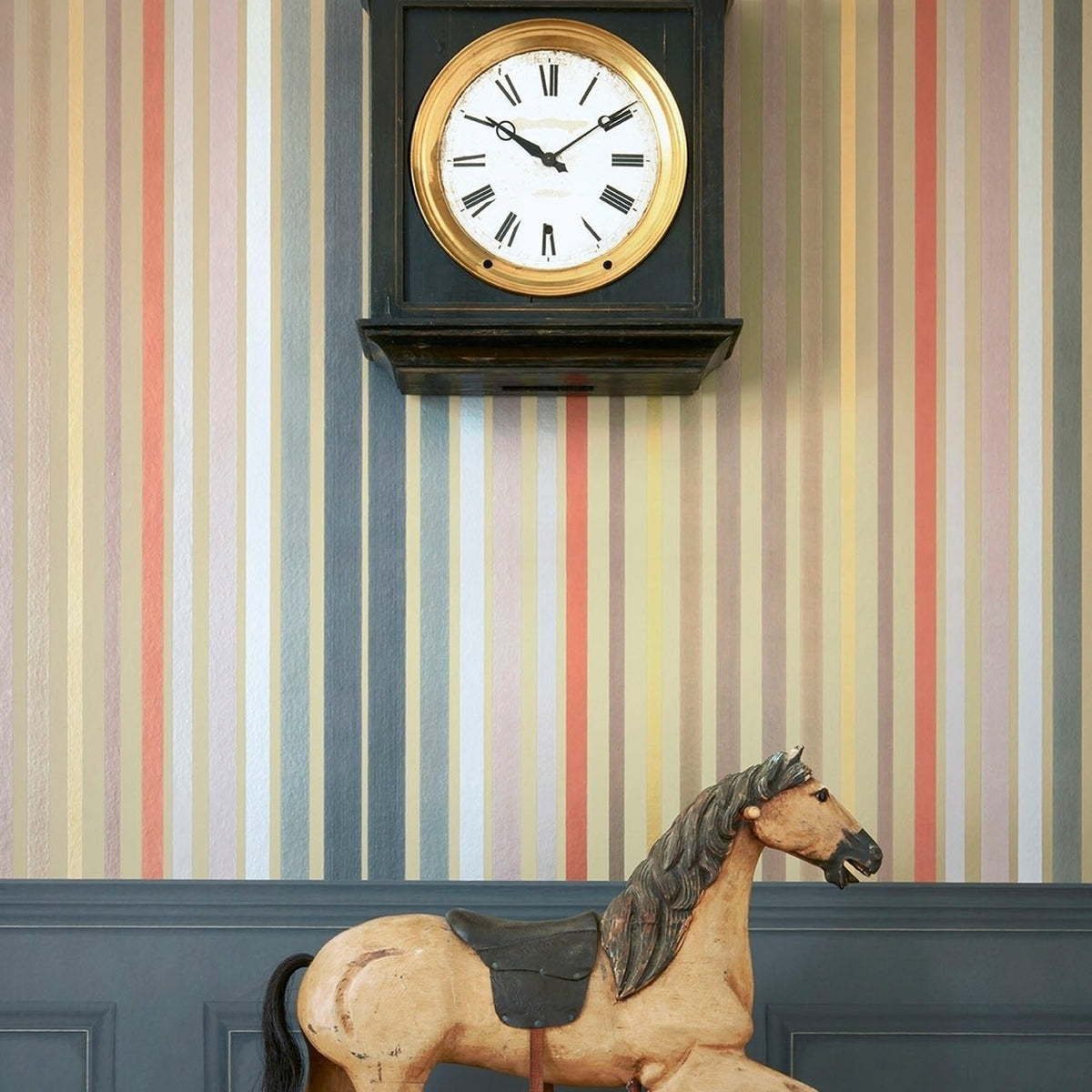 Cole & Son carousel stripe wallpaper in Linen & Multi — lifestyle