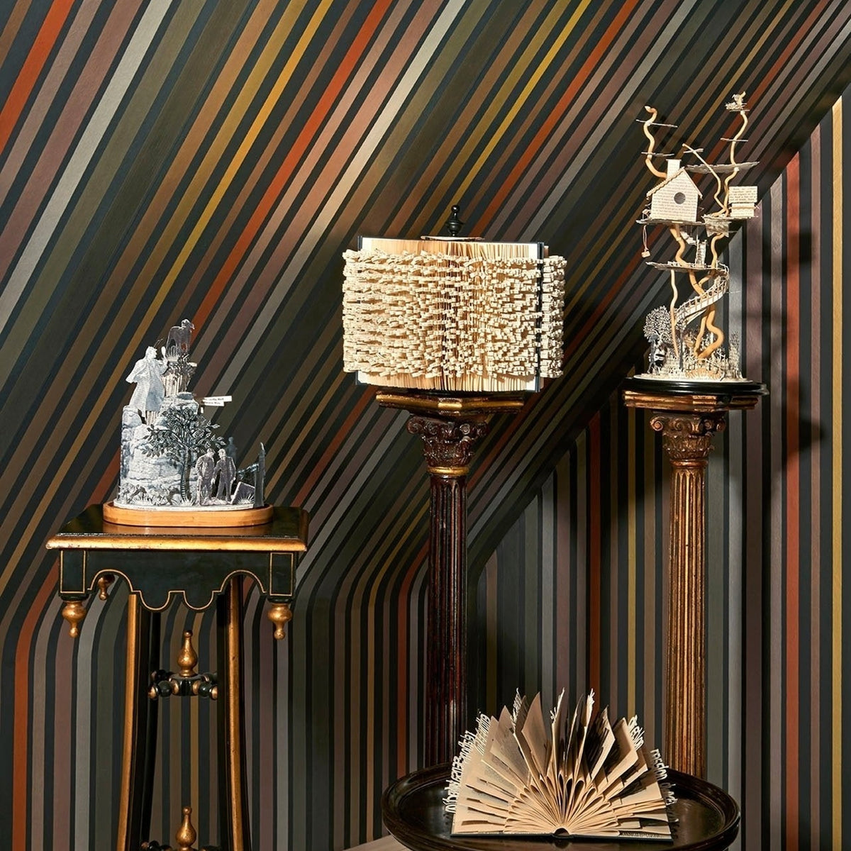 Cole & Son carousel stripe wallpaper in Black & Multi — lifestyle