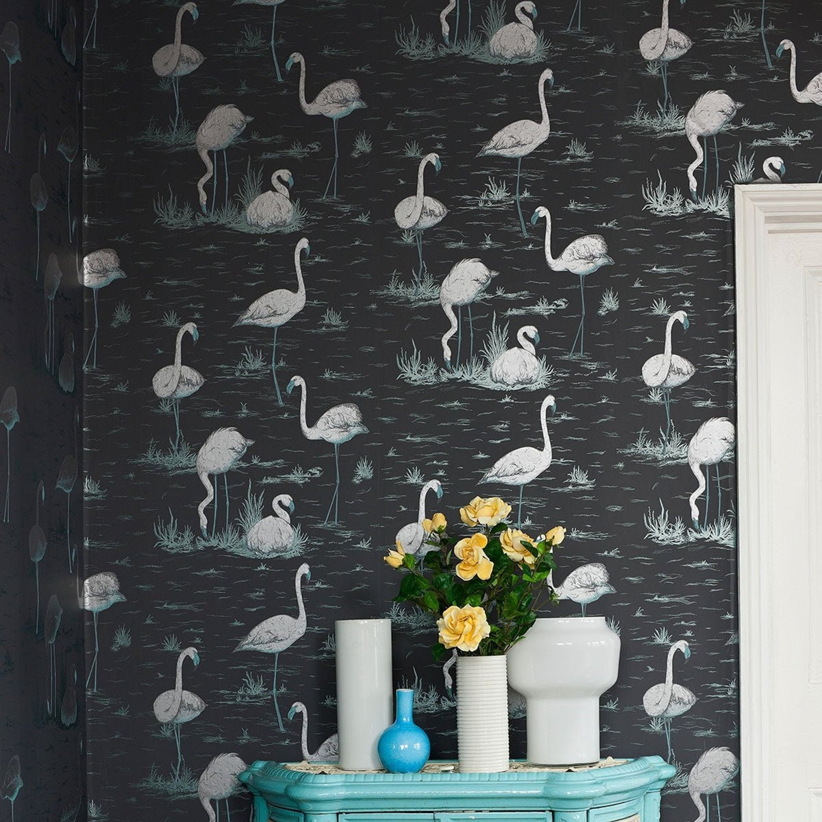 Cole & Son flamingos wallpaper in Metallic Silver & Teal on Charcoal — lifestyle