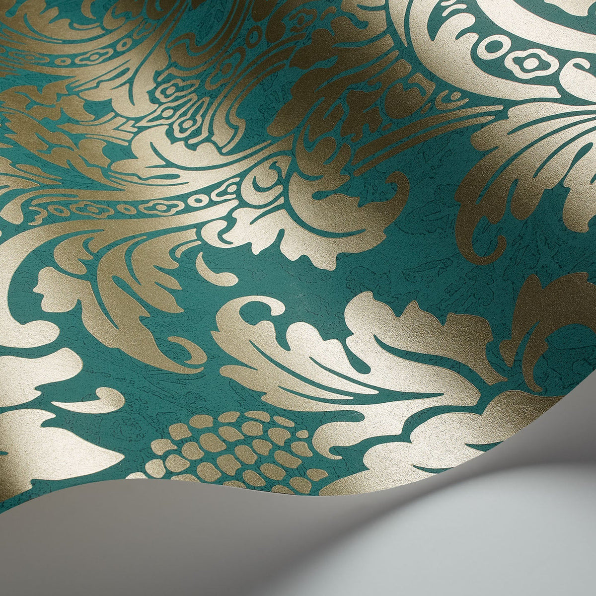 Cole & Son Blake wallpaper in Metallic Gold on Teal — detail