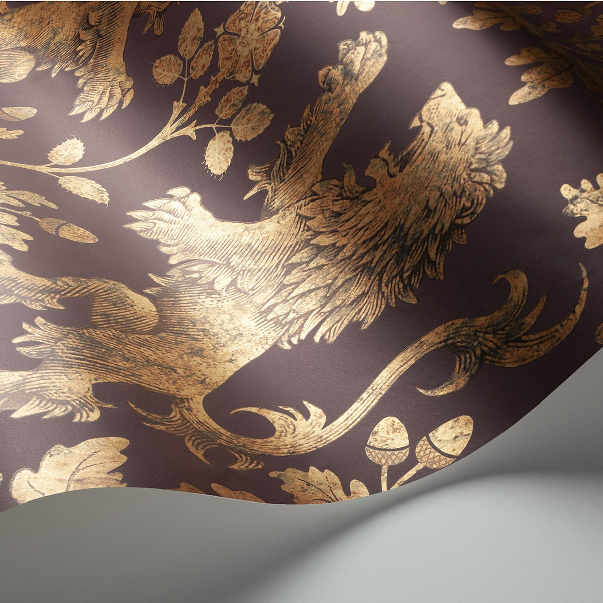 Cole & Son Boscobel Oak wallpaper in Metallic Autumnal Gold on Claret — detail