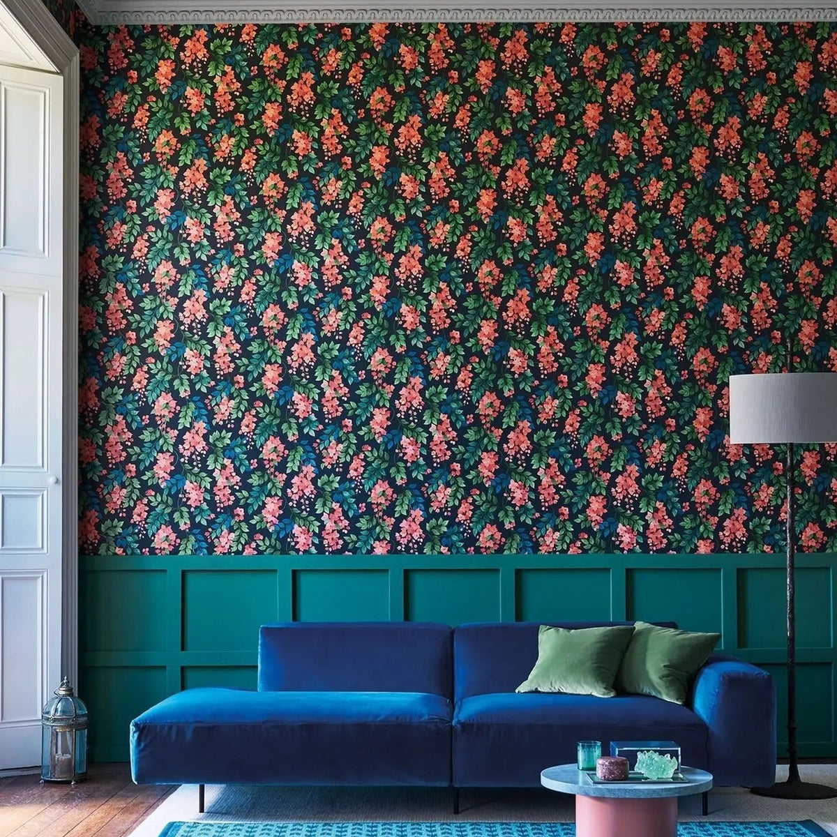 Cole & Son Bougainvillea wallpaper in Rouge, Leaf Green & Cerulean Sky on Charcoal — room setting; coordinating wallpaper sold separately
