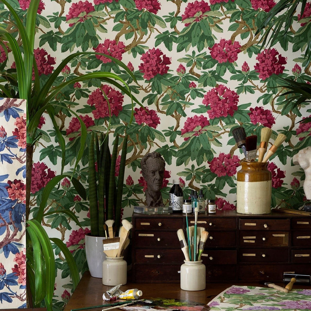 Cole & Son Bourlie wallpaper in Cerise, Leaf Green on White — room setting