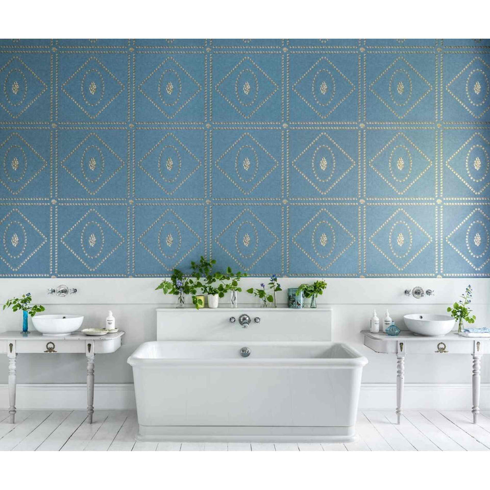 Detail of Cole & Son Conchiglie wallpaper in Gilver on Denim