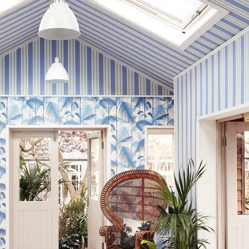 Cole & Son Polo Stripe wallpaper — Hyacinth Blue & Cerulean room setting alongside Palm Jungle