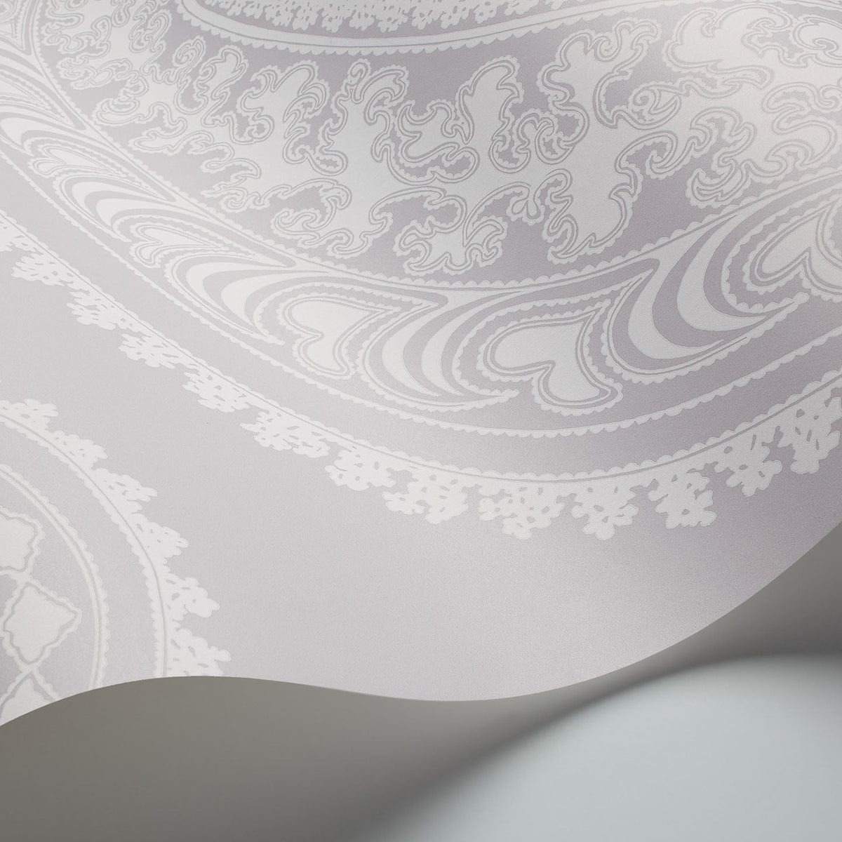 Rajapur wallpaper in Chalk on Heath Grey by Cole & Son — finish detail