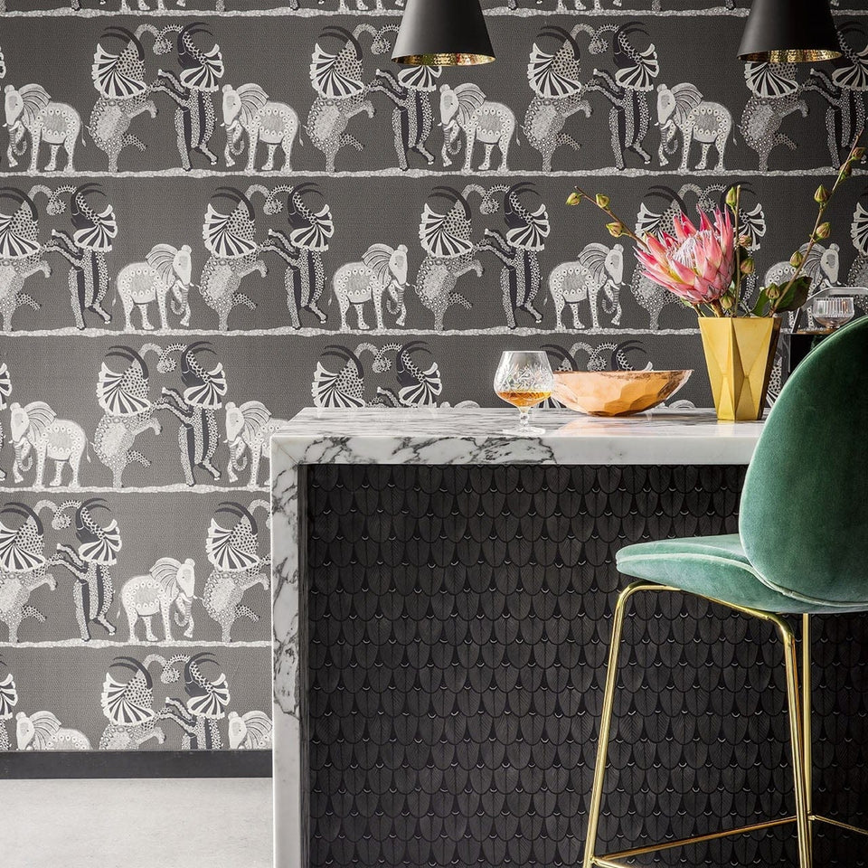 Safari Dance wallpaper by Cole & Son in Stone & Black on Charcoal, room setting
