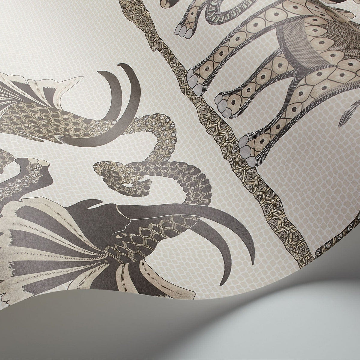 Safari Dance wallpaper by Cole & Son in Linen & Charcoal on Parchment, curved paper detail