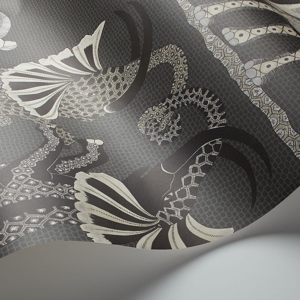 Safari Dance wallpaper by Cole & Son in Stone & Black on Charcoal, curved paper detail