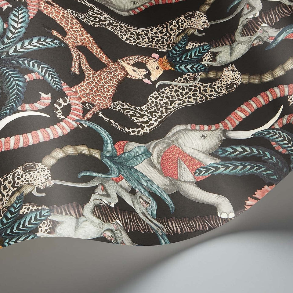 Safari Totem wallpaper by Cole & Son in Ruby & Print Room Blue on Charcoal, curved paper detail
